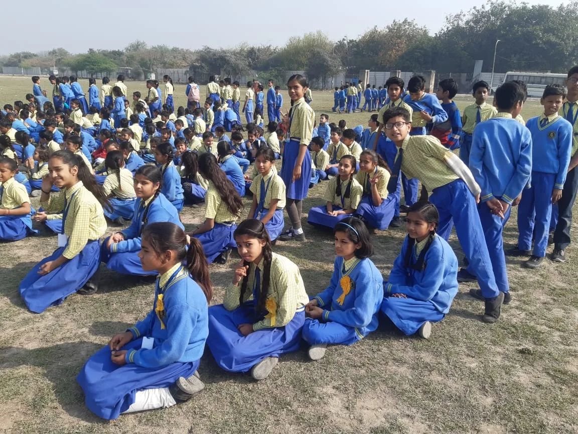Students of Ayush Public School gathered on the ground during the annual sports meet